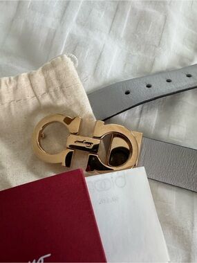 Salvatore Ferragamo Black or Gray Leather Belt with Gold Double Gancio Buckle.